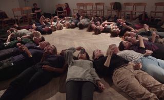Johan Rosenmunthe's 'Tectonic Crystal Healing' members of the audience laid in a circle