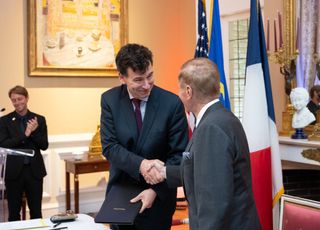 NASA Administrator Bill Nelson, right, and President of the Centre National d’Etudes Spatiales (CNES) Dr. Philippe Baptiste shake hands following the signing the Artemis Accords Tuesday, June 7, 2022, prior to the CNES 60th Anniversary event at the French Ambassador’s Residence in Washington. 