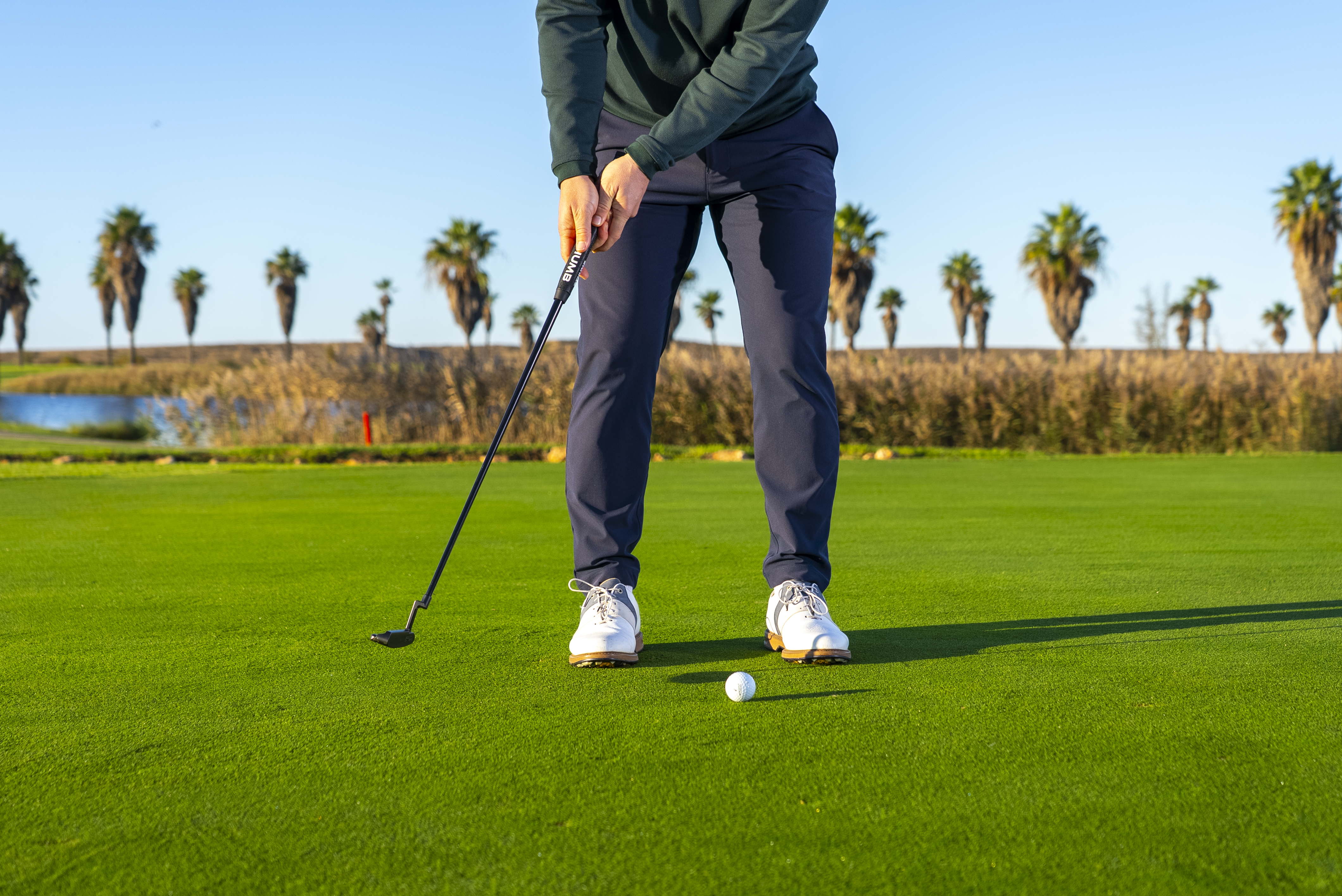 Putting Specialist Coach James Jankowksi demonstrating the correct backswing in the putting stroke