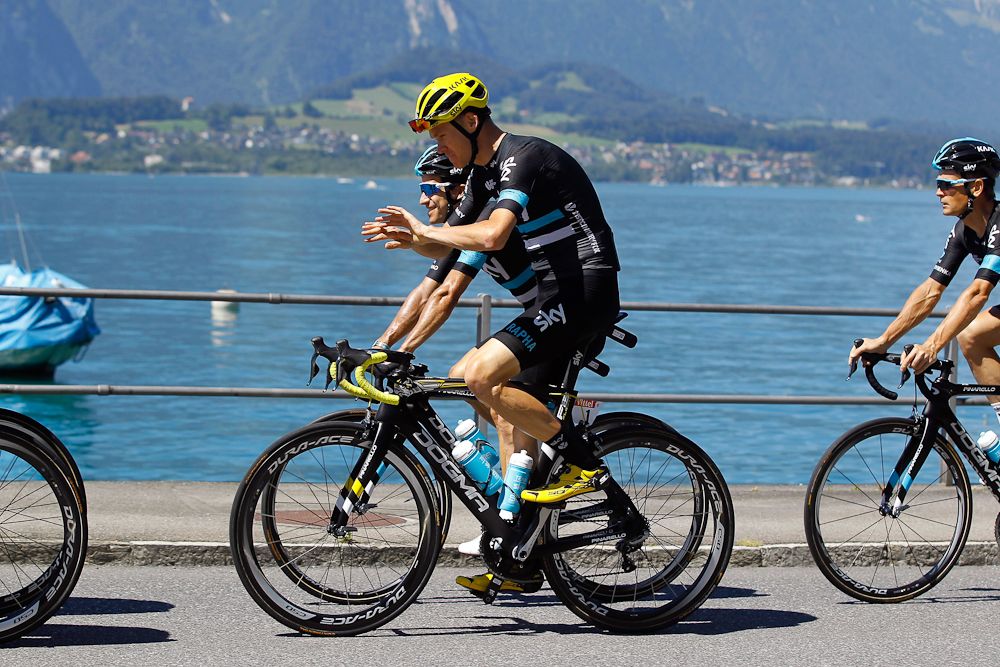 'Look, Ma, no hands,' Chris Froome appears to say while riding with Team Sky during the Tour's second rest day.