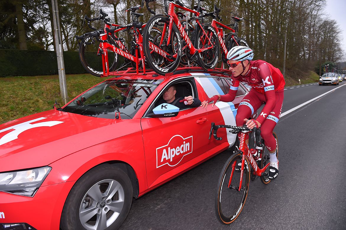 Nils Politt visits his team car at Kuurne-Brussel-Kuurne.
