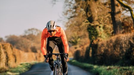 Male cyclist riding outdoors