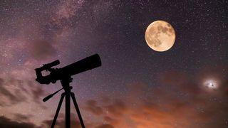 telescope against a starry sky with the moon