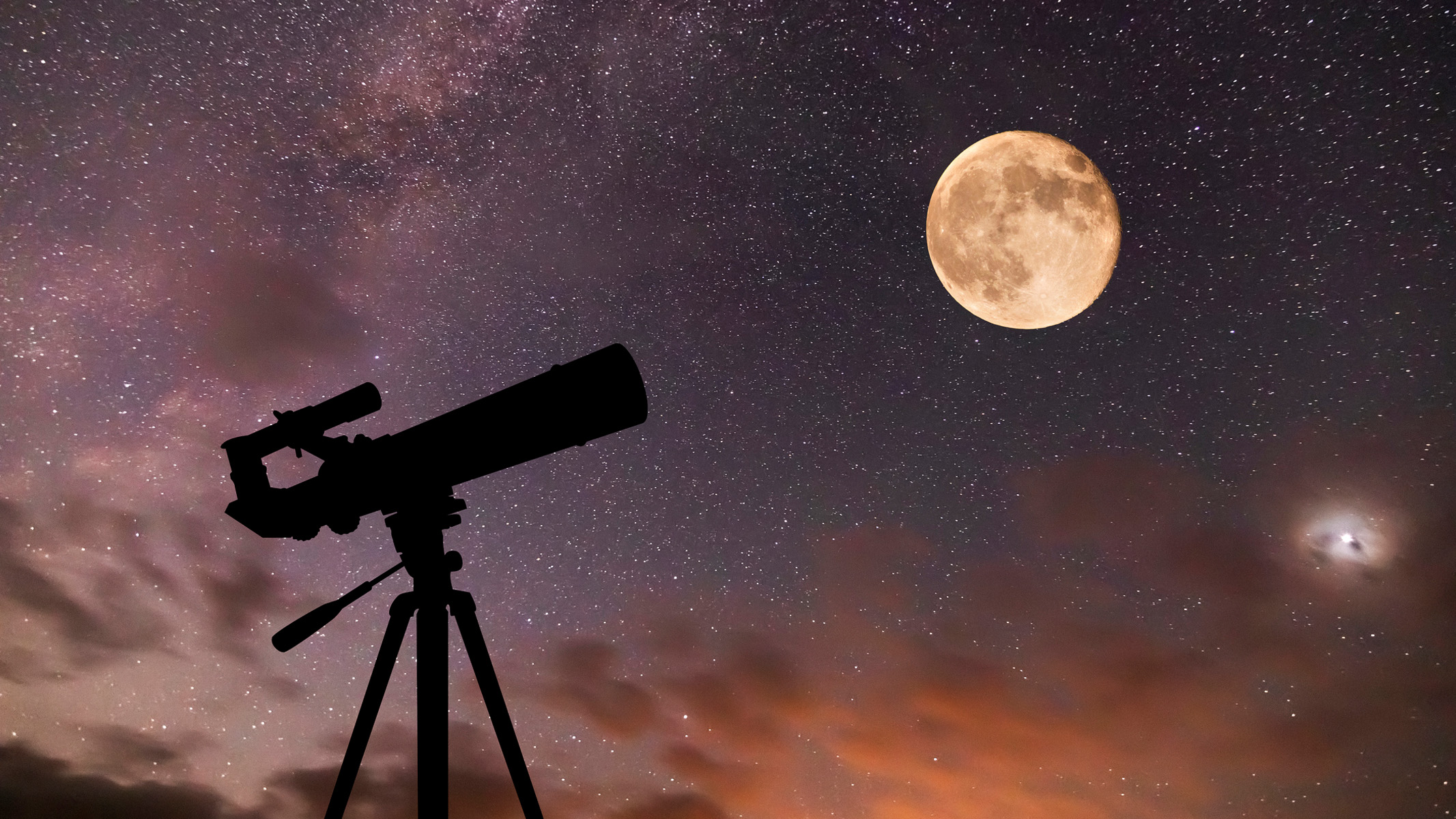telescope against a starry sky with the moon