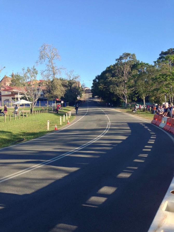The high-speed downhill run into the final bend nearing the finish line