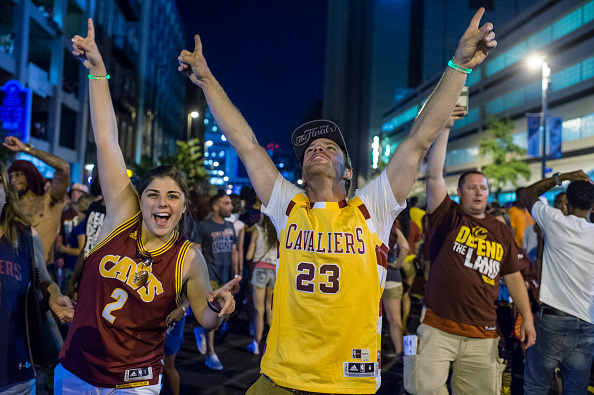 Fans and newscasters alike reacted strongly when they learned that the Cleveland Cavaliers were NBA champions.