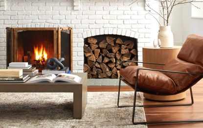Living room with fireplace and brown leather chair used as a couch alternative