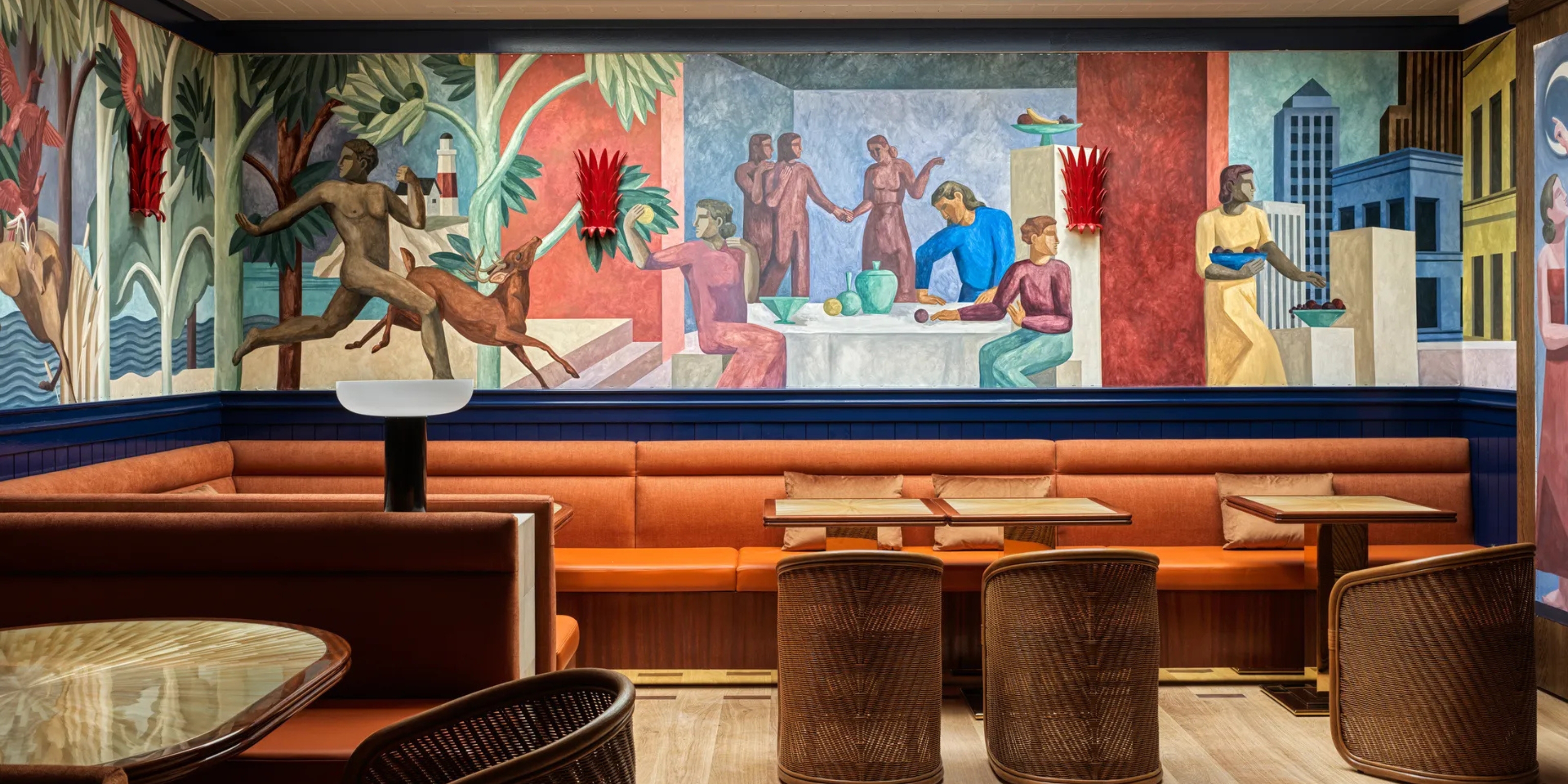 A clad-in-murals-wood-and-leather hotel bar showcases a figurative wall-large painting in earthy tones, along with 1970s-inspired sculptural furniture.