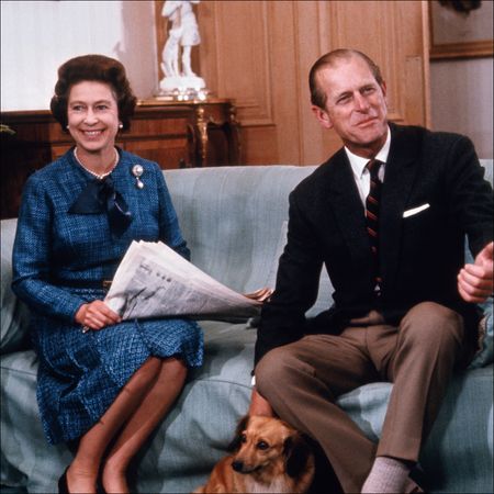 Queen Elizabeth II and Prince Philip relax at Balmoral castle in this 9/76 photo, released when she formally opened Parliament, last month. the year 1977 marks the 25th year of her reign