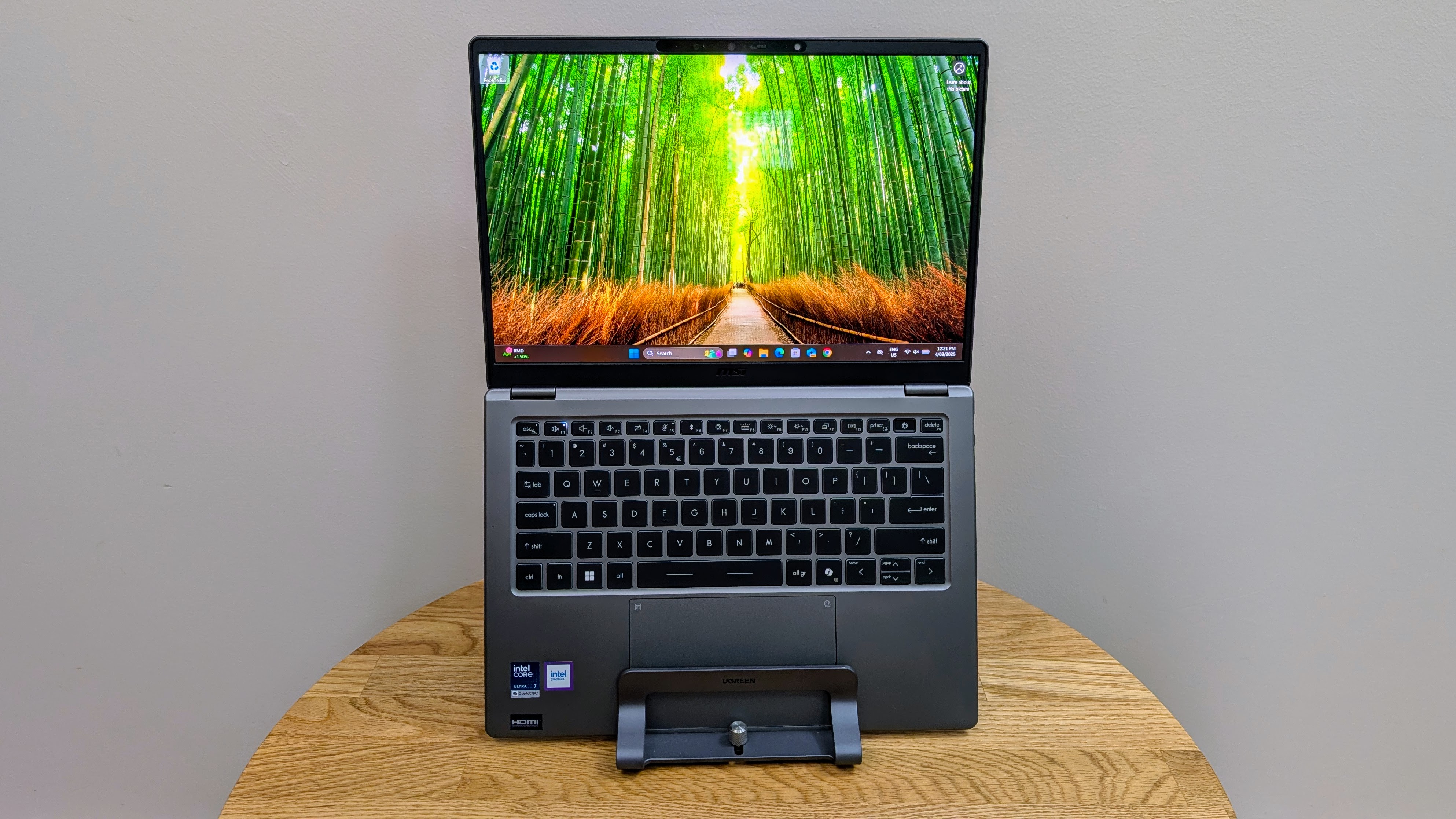 MSI Prestige 14 AI+ open in a vertical stand