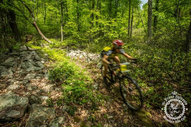 Jessica Nankman descends past a rock a garden on the Enduro Stage