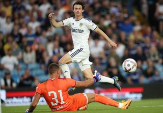 Brenden Aaronson of Leeds United crosses the ball into the box during the Pre-Season friendly match between Leeds United and Cagliari at Elland Road on July 31, 2022 in Leeds, England.