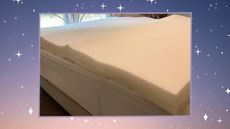Allswell Memory Foam Mattress Topper on black bed frame on pink and purple background with sparkless