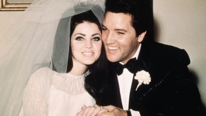 Prescilla and Elvis Presley on their wedding day