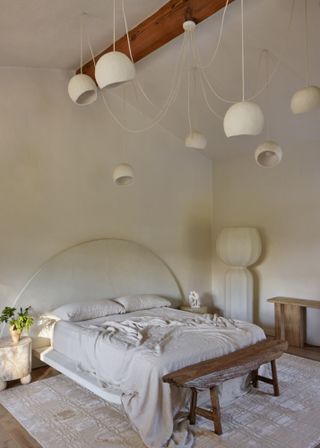 White bedroom with limewash walls