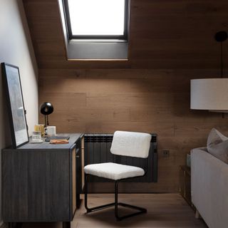 desk beneath skylight