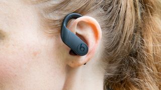 a photo of the Powerbeats Pro in a female's ear