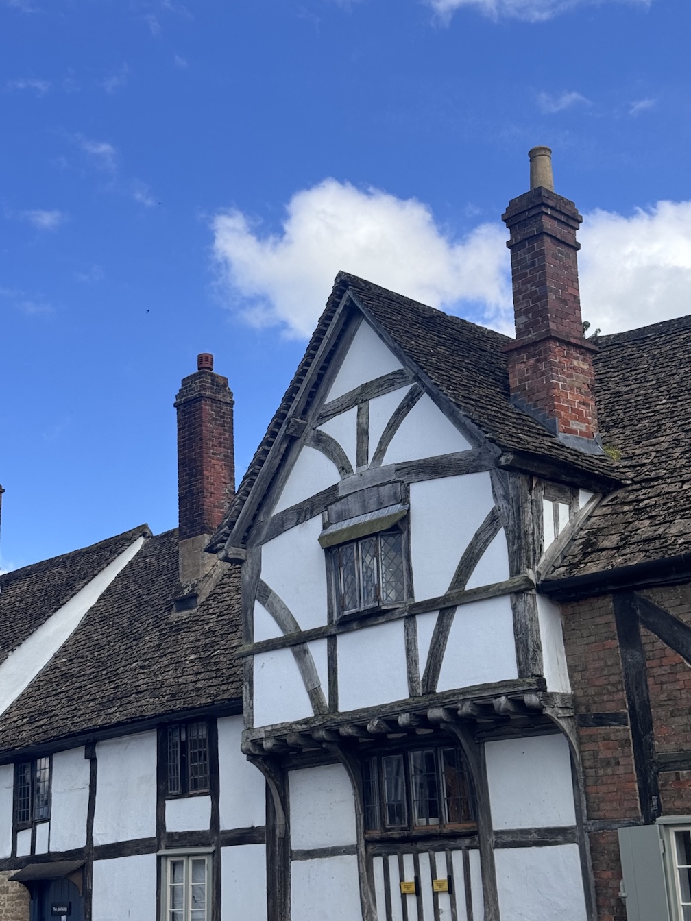 A white timbered building in Lacock, England
