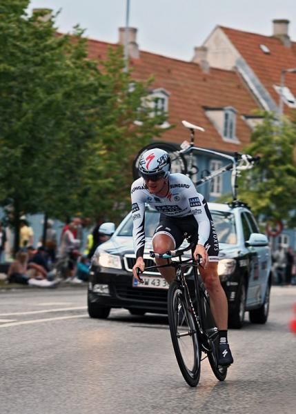 A Saxo Bank Sungard rider powers his way through the time trial.