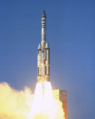 A U.S. Air Force Titan III-C rocket lifts off from (then) Cape Kennedy's Launch Complex 40, in a test of the Gemini-B configuration for the Manned Orbiting Laboratory (MOL) program on Nov. 3, 1966. Known officially as the Gemini-B/MOL Heat Shield Qualification Test, it was the only mission ever flown in the Manned Orbiting Laboratory program.