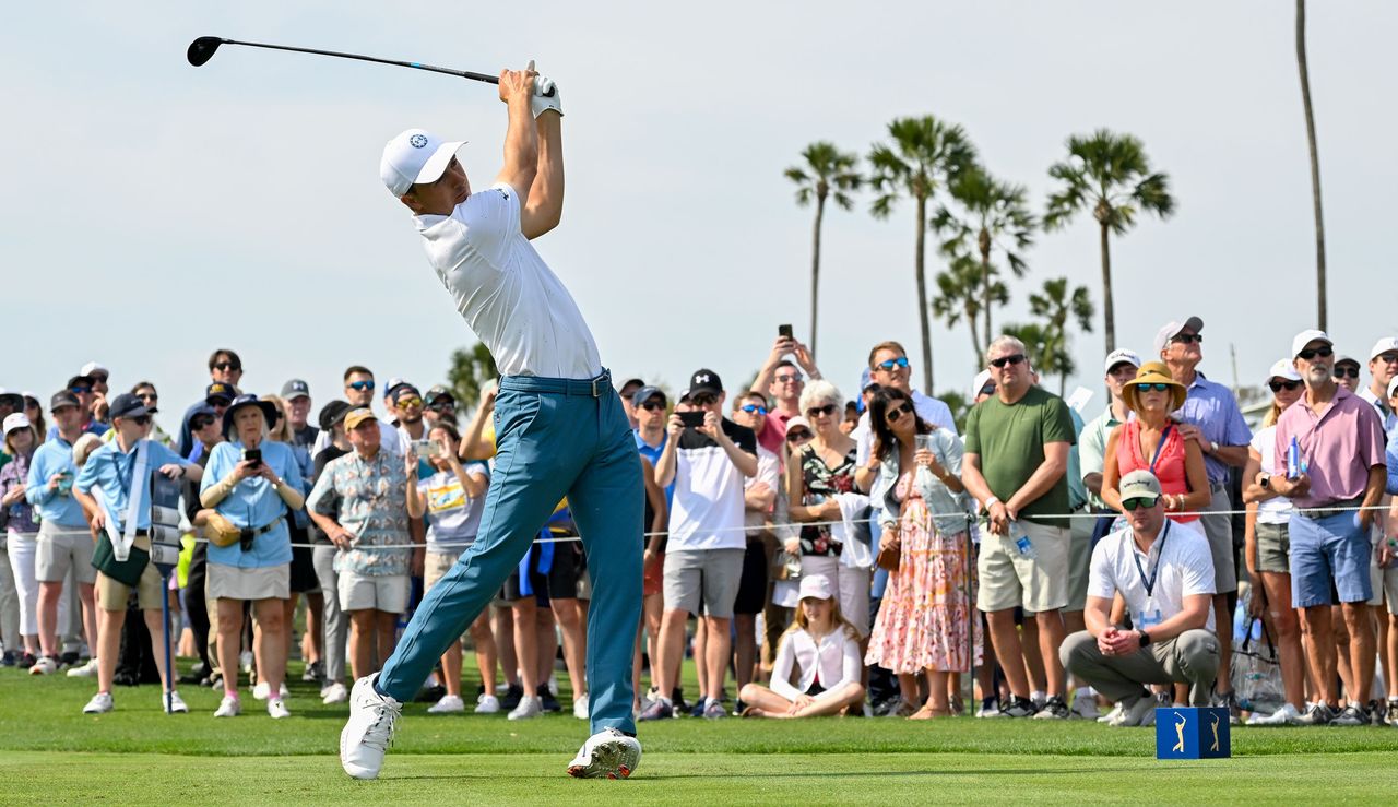 Spieth drives off the tee