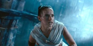Rey crouches in a scene from Star Wars: The Rise of Skywalker