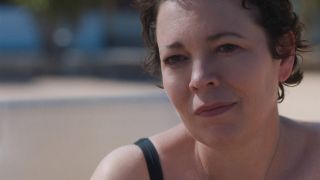 Olivia Colman smiling in The Lost Daughter.