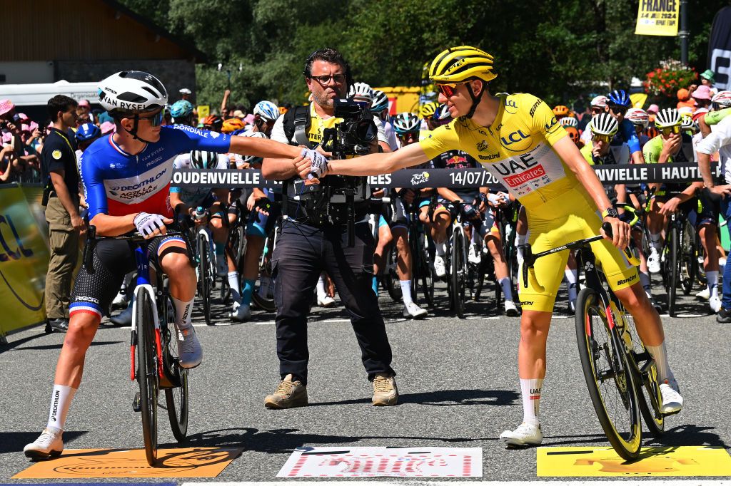 LOUDENVIELLE FRANCE JULY 14 LR Paul Lapeira of France and Decathlon AG2R La Mondiale Team and Tadej Pogacar of Slovenia and UAE Team Emirates Yellow Leader Jersey prior to the 111th Tour de France 2024 Stage 15 a 1977km stage from Loudenvielle to Plateau de Beille 1782m UCIWT on July 14 2024 in Loudenvielle France Photo by Tim de WaeleGetty Images