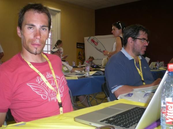 Former Rabobank rider Pedro Horrillo hard at work on a hot day in the Tour de France's press room.