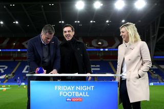 Jamie Carragher, Gary Neville and Kelly Cates share a laugh at pitchside in Cardiff while presenting for Sky Sports