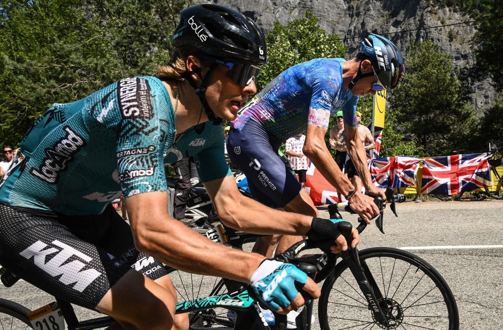 BB HotelsKTM teams Austrian rider Sebastian Schonberger L and IsraelPremier Tech teams British rider Chris Froome R cycle in a breakawaye during the 12th stage of the 109th edition of the Tour de France cycling race 1651 km between Briancon and LAlpedHuez in the French Alps on July 14 2022 Photo by Marco BERTORELLO AFP Photo by MARCO BERTORELLOAFP via Getty Images