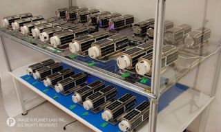 The 28 Dove satellites that make up the Flock 1 mission for the U.S. company Planet Labs are seen here before delivery to the International Space Station. They make up the largest single constellation of Earth-imaging satellites ever to launch into space.
