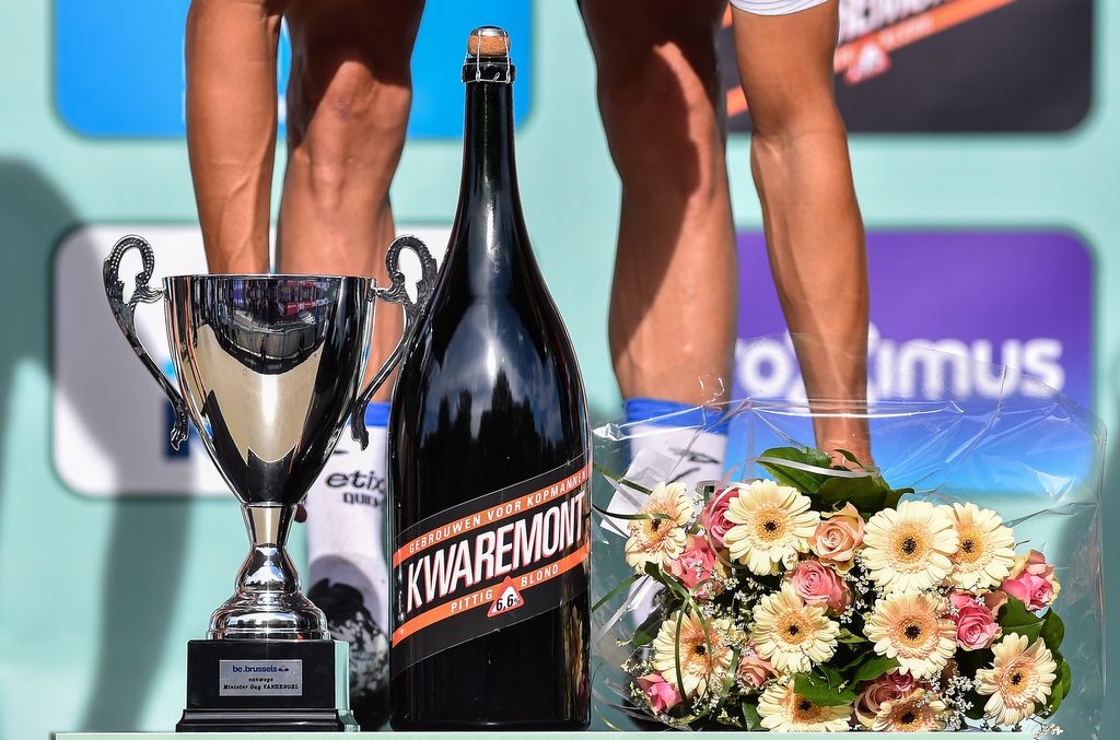 A trophy, beer and flowers for the winner