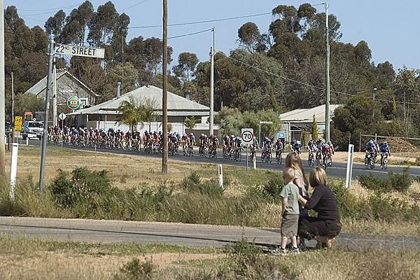 The peloton string out in pursuit of four riders who had broken away earlier on the stage.