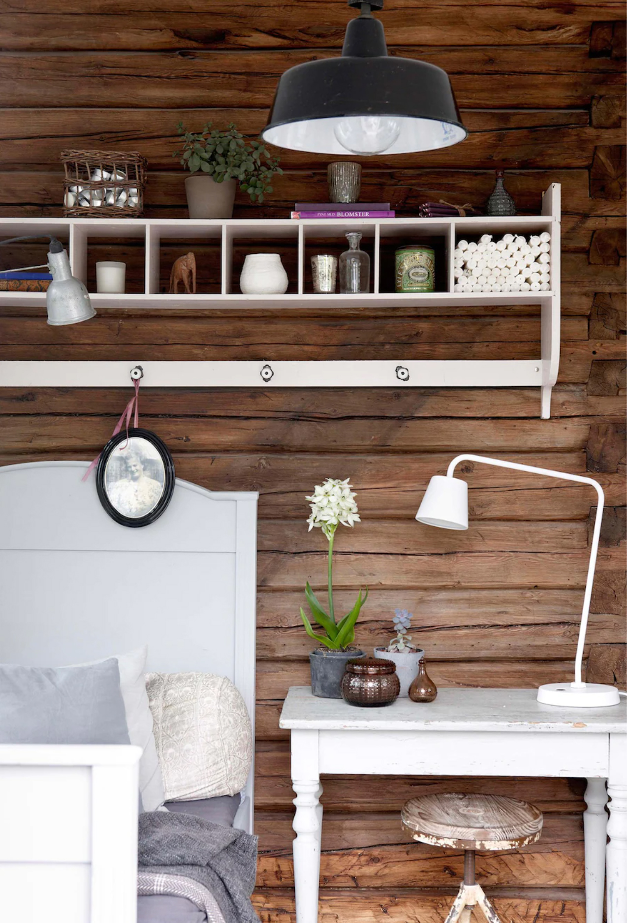 Rustic bedroom with wood panelled walls