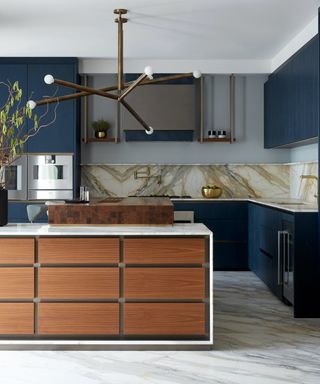 A bespoke kitchen featuring Golden Calacatta Borghini marble.