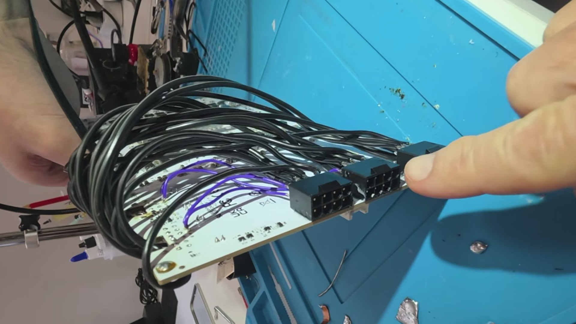 A modified Galax RTX 5090 graphics card with triple 8-pin PCIe power connectors