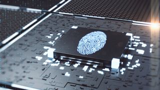 A fingerprint glowing on a computer chip.