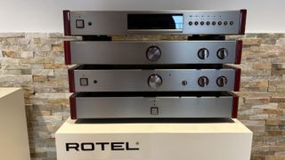 Stack of original Rotel Michi electronics on a stand