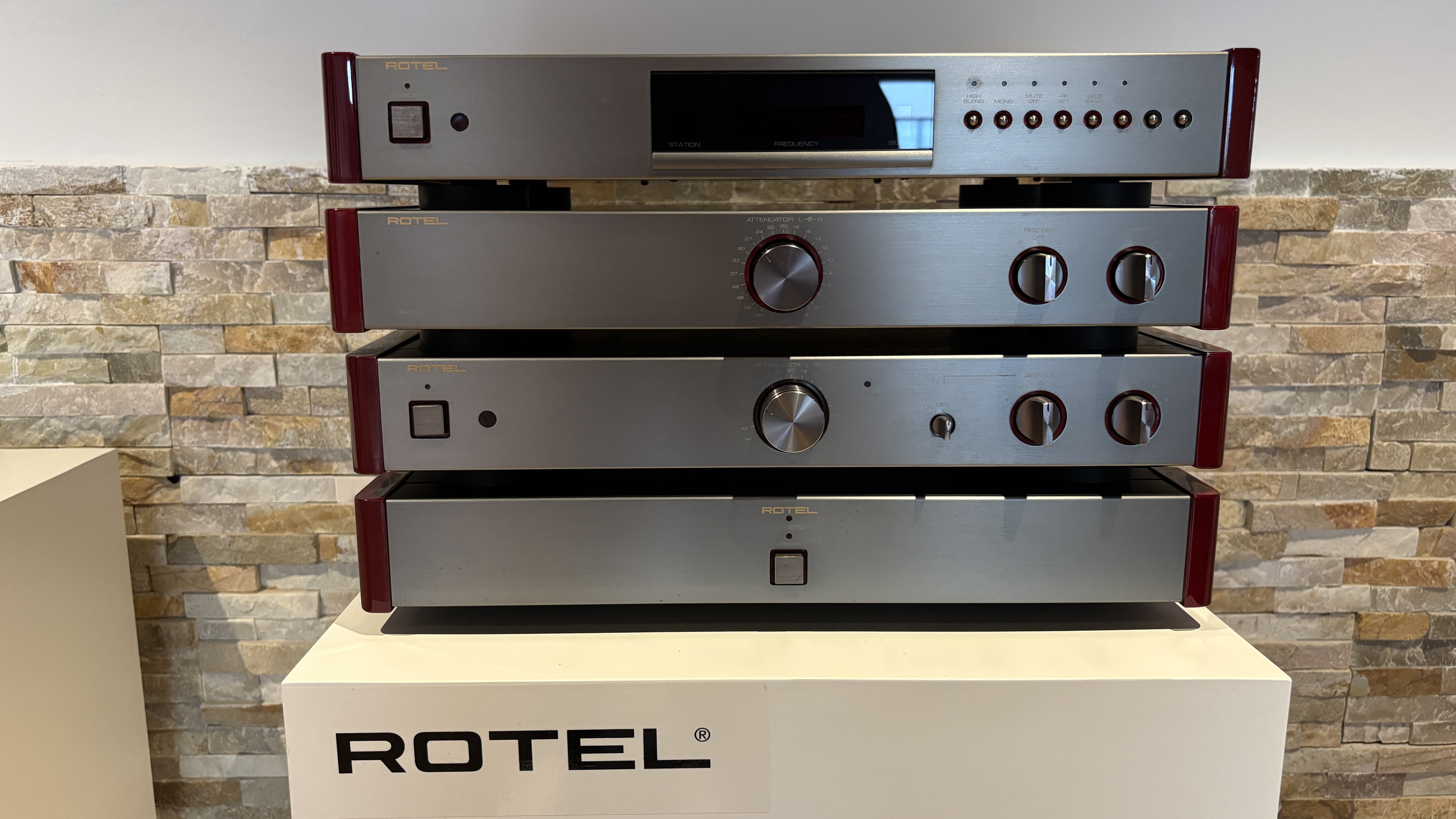 Stack of original Rotel Michi electronics on a stand