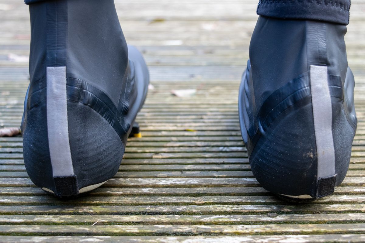 A rider wearing the GripGrab Aquashield overshoes