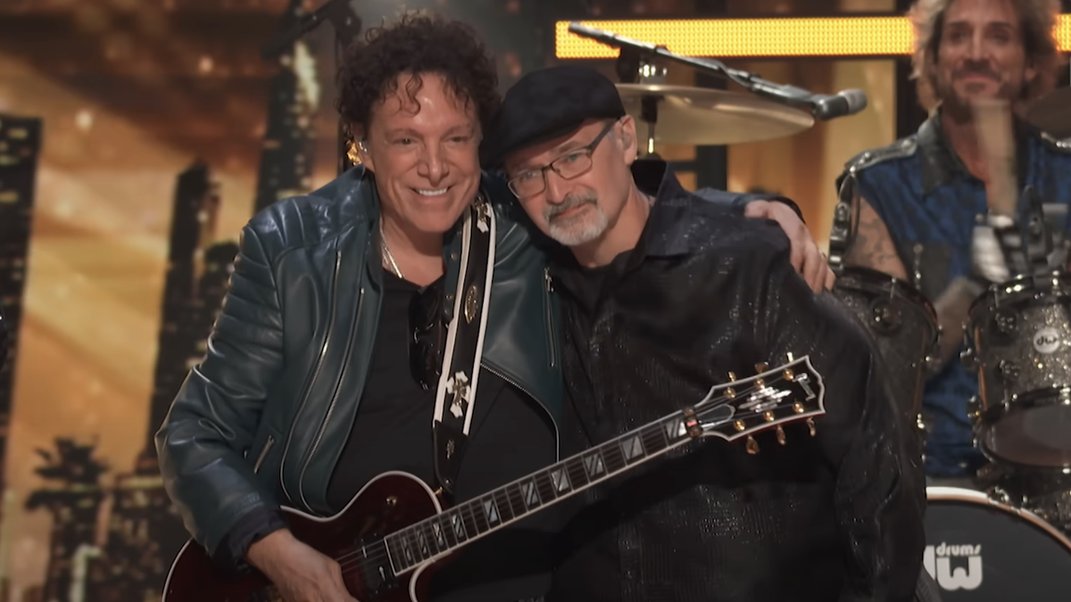 Richard Goodall with Neal Schon of Journey on America&#039;s Got Talent Season 19 finale