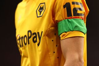 GrePlayers of Wolves are seen wearing a sustainable green arm band in support of green football weekend during the Premier League match between Wolverhampton Wanderers and Liverpool FC at Molineux on February 04, 2023 in Wolverhampton, England. In a Premier League first, both sets of players, and match officials, will wear Green Football Weekend sustainable green armbands to highlight the initiative and put the conversation about climate change and sustainability on the world stage. (Photo by Naomi Baker/Getty Images)(Photo by Naomi Baker/Getty Images)