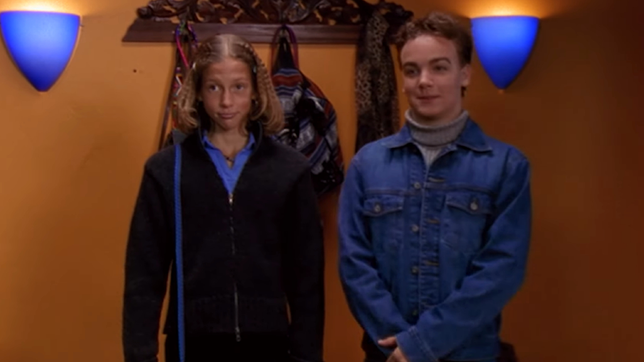 Emma (Miriam McDonald) and Sean (Daniel Clark) take a photo before their first date together in Season 1, Episode 11.