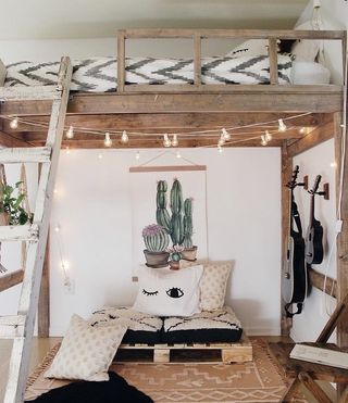 Wooden loft bed with string lights