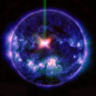 The huge X1.6-class solar flare is seen erupting from the sun in this three-wavelength composite image captured by NASA's Solar Dynamics Obervatory on Sept. 10, 2014. The solar flare occurred at 1:45 p.m. ET.