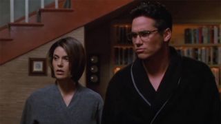 Dean Cain and Teri Hatcher In Lois & Clark bathrobes.