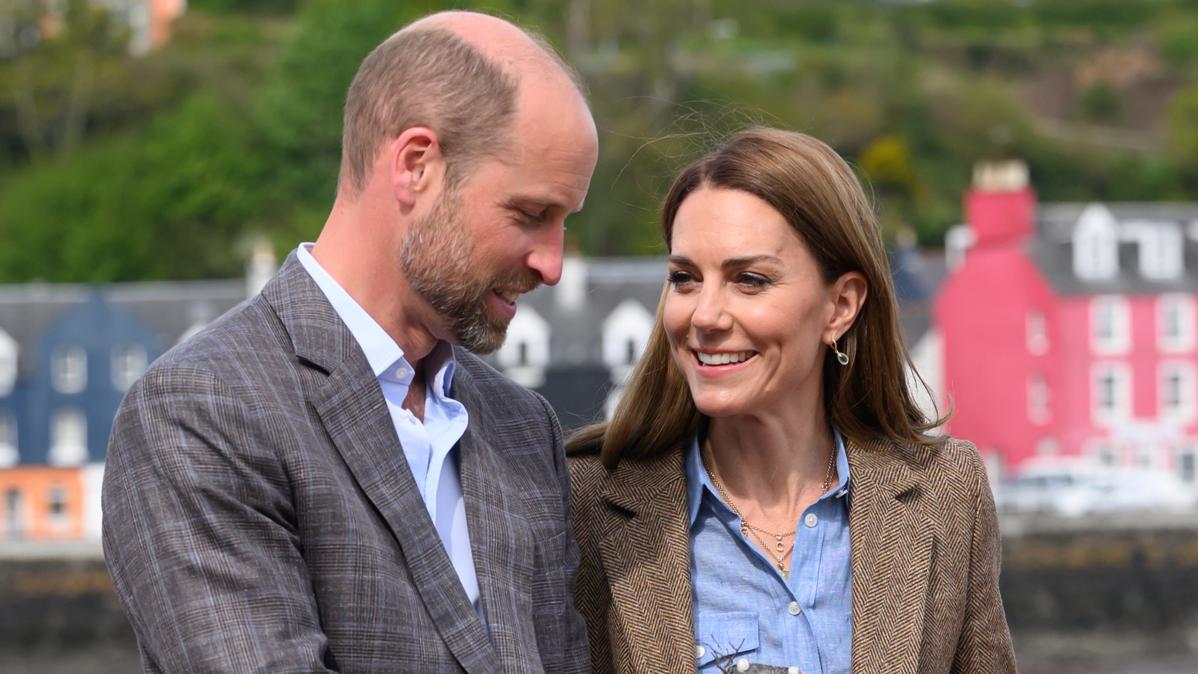 Prince William and Catherine, Princess of Wales smile during a tour of an artisan market on April 29 in Tobermory, Scotland