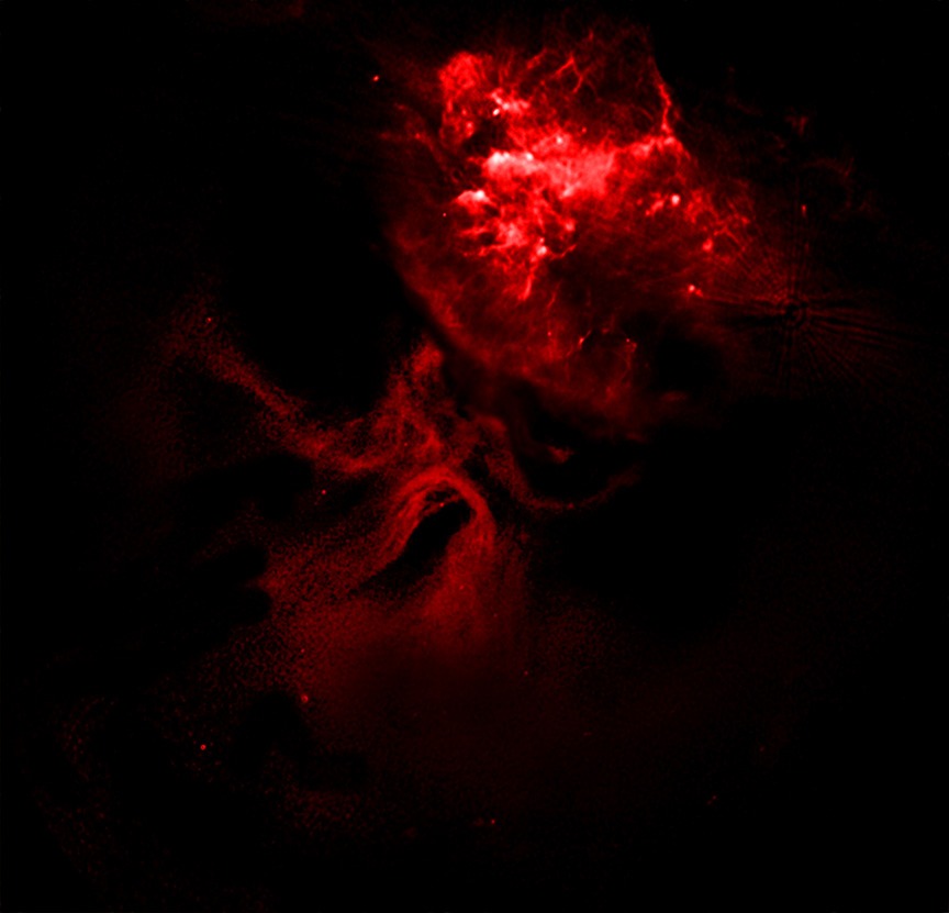 a red wispy cloud on a black background