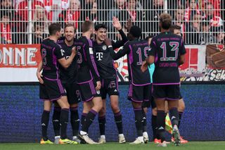 Harry Kane celebrates with his Bayern Munich team-mates after scoring against Union Berlin in April 2024.